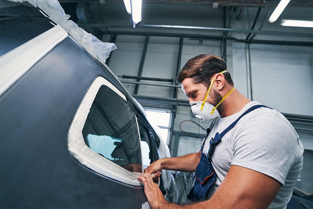 Panel beater repairing car body